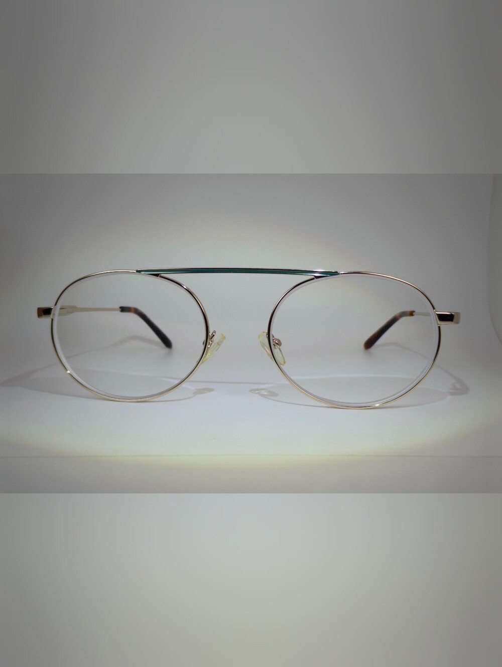 Contour. Women's Silver Aviator Glasses with Teal Brow Bar.